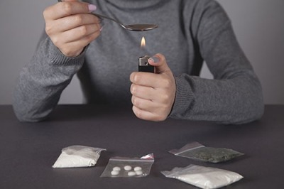 woman consuming drugs